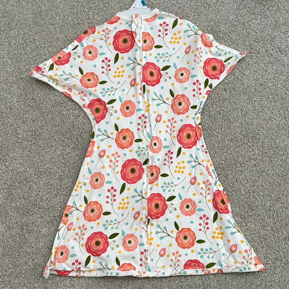 Floral sleeping baby zipadee-zip swaddle blanket